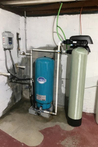 Whole-house well water filtration system installation with pressure tank in South Jersey